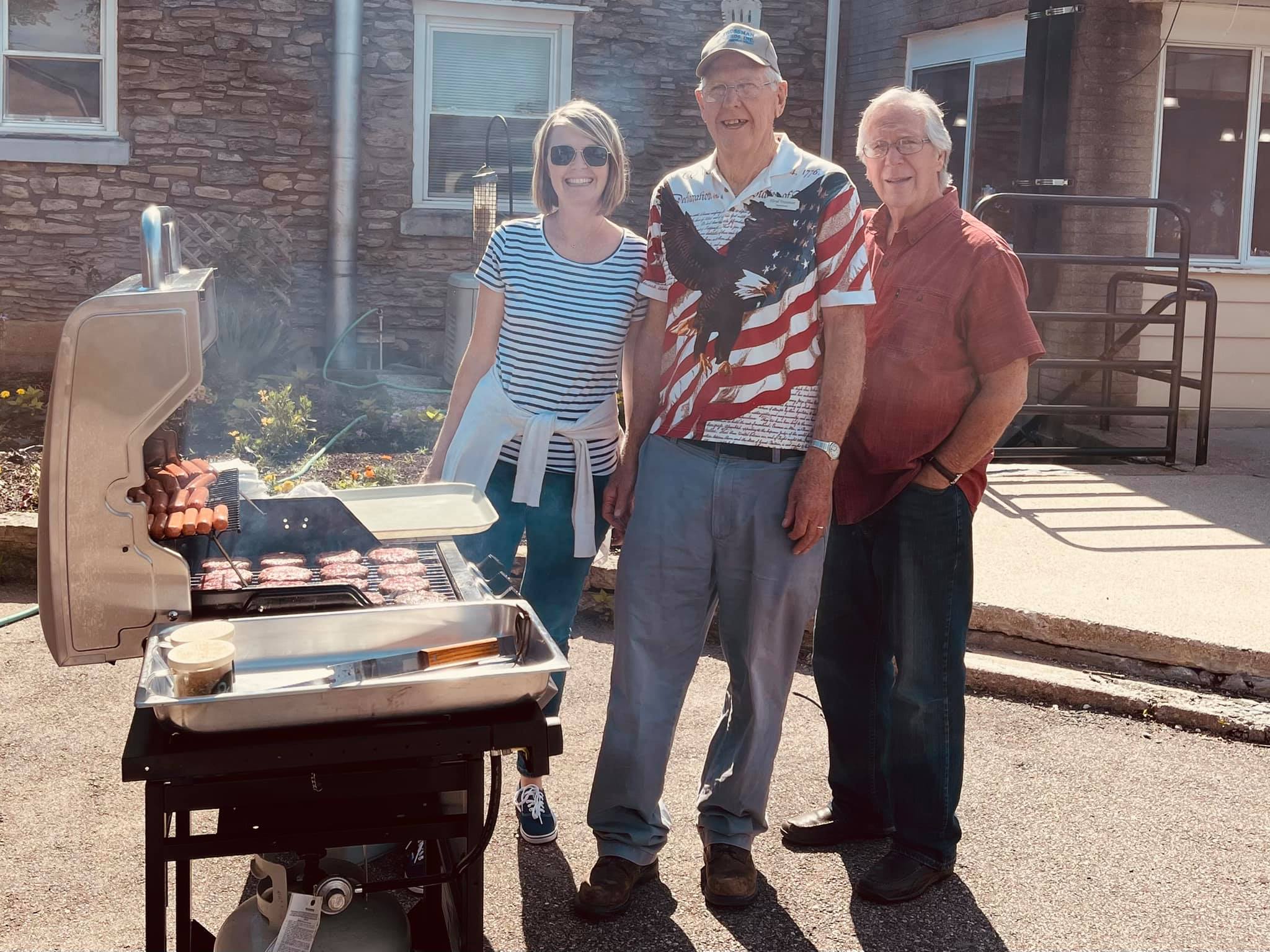 Image of people grilling.