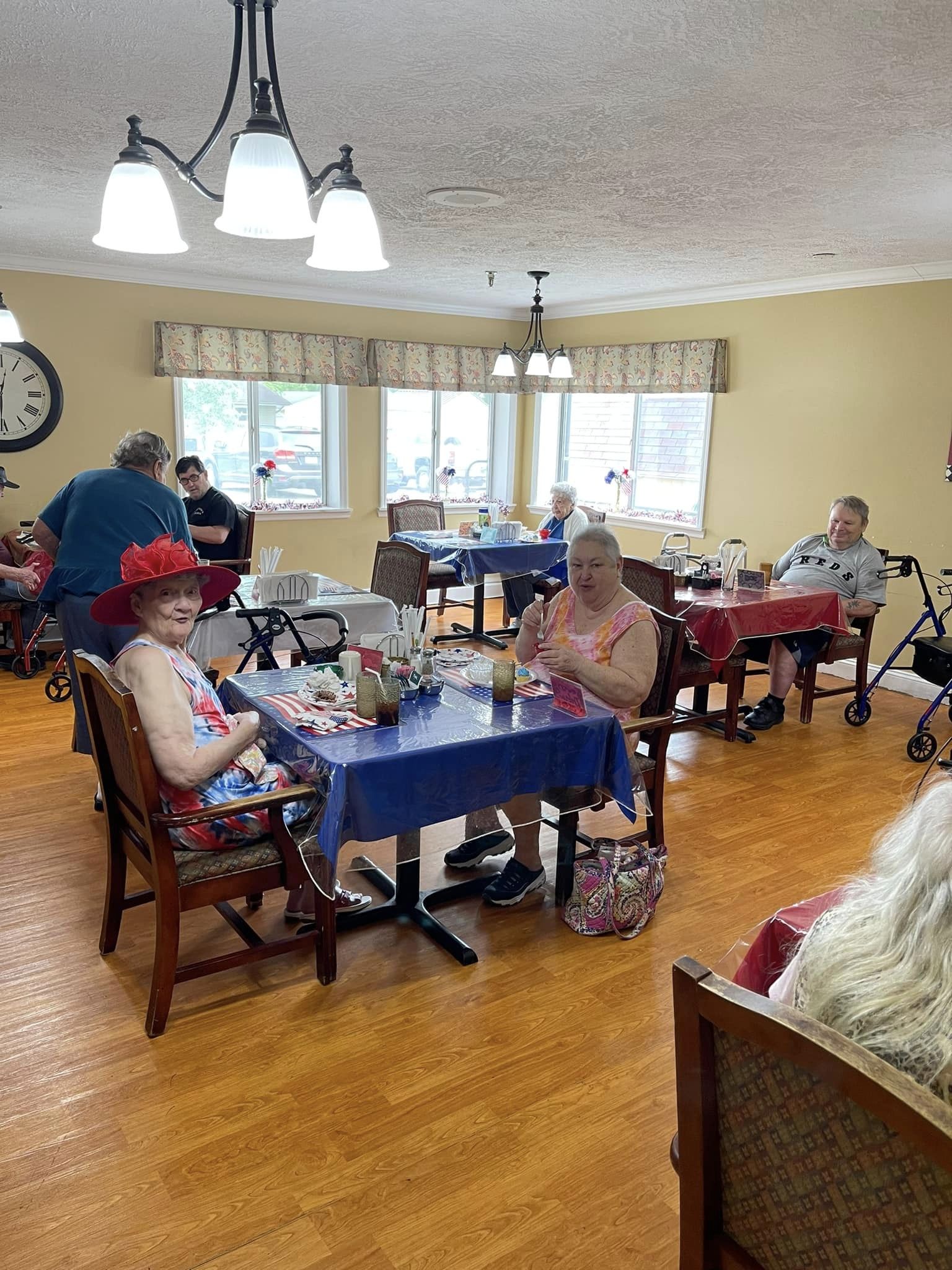 Image of residents in the dining room.