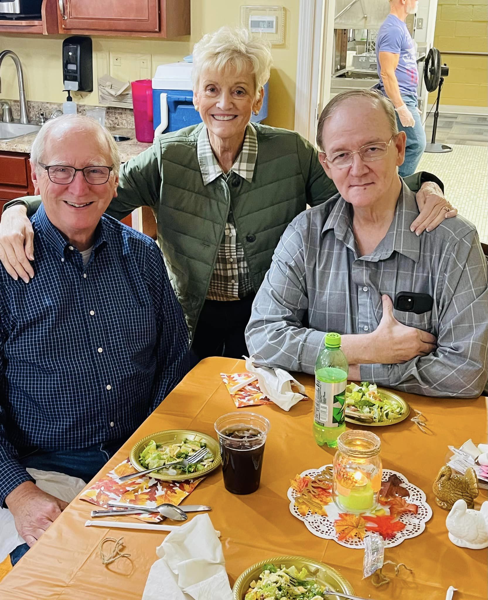 Images of residents enjoying a meal.